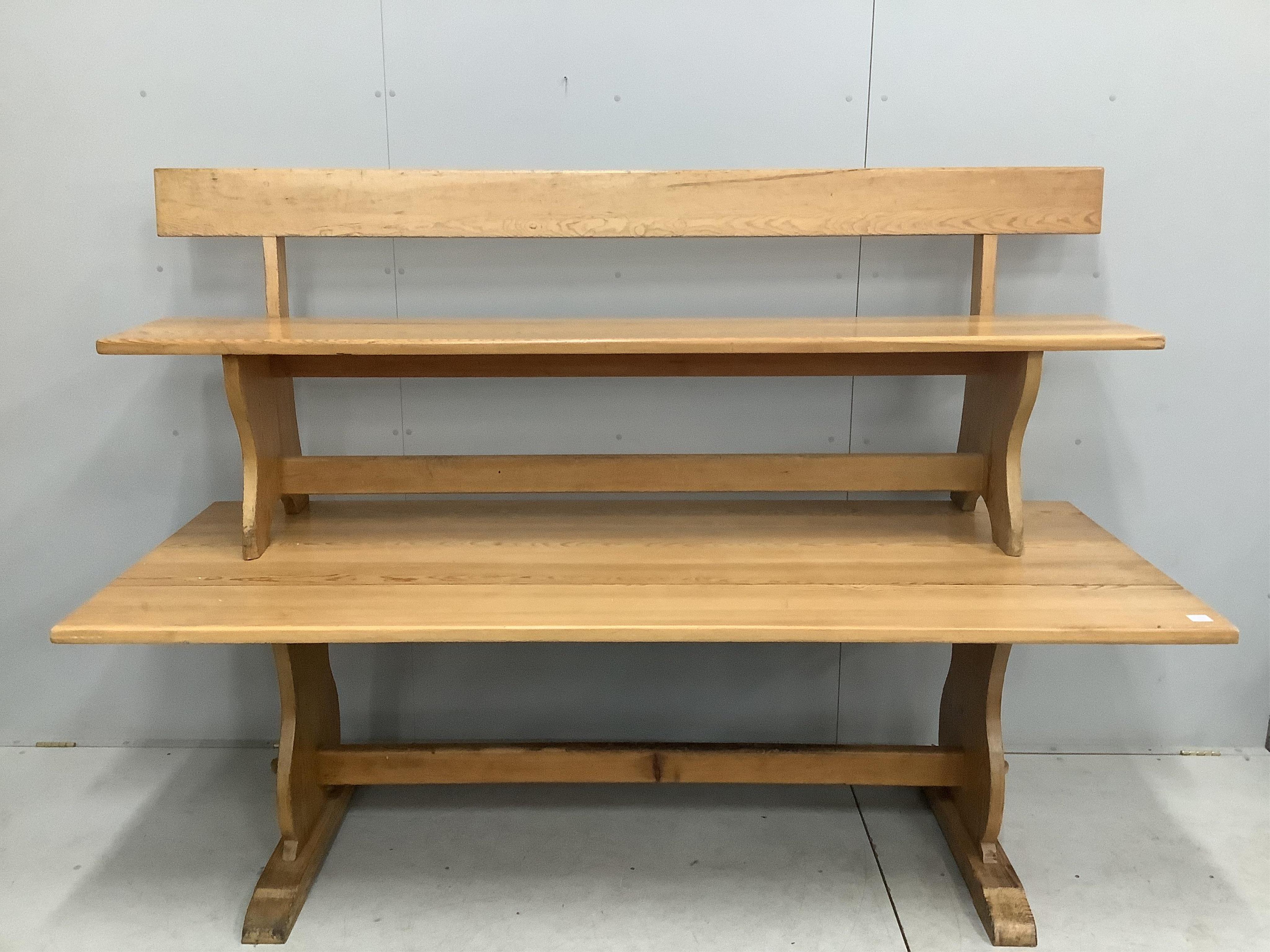 A modern rectangular pine refectory dining table, width 229cm, depth 90cm, height 73cm, together with a pine bench. Condition - fair